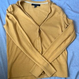 yellow cardigan